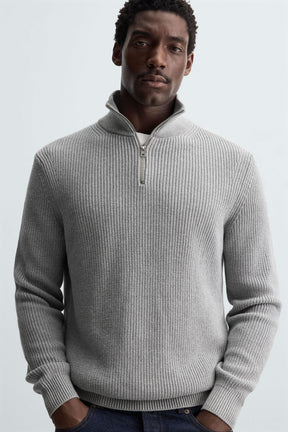 LINKSGESTRICKTER PULLOVER MIT REISSVERSCHLUSS