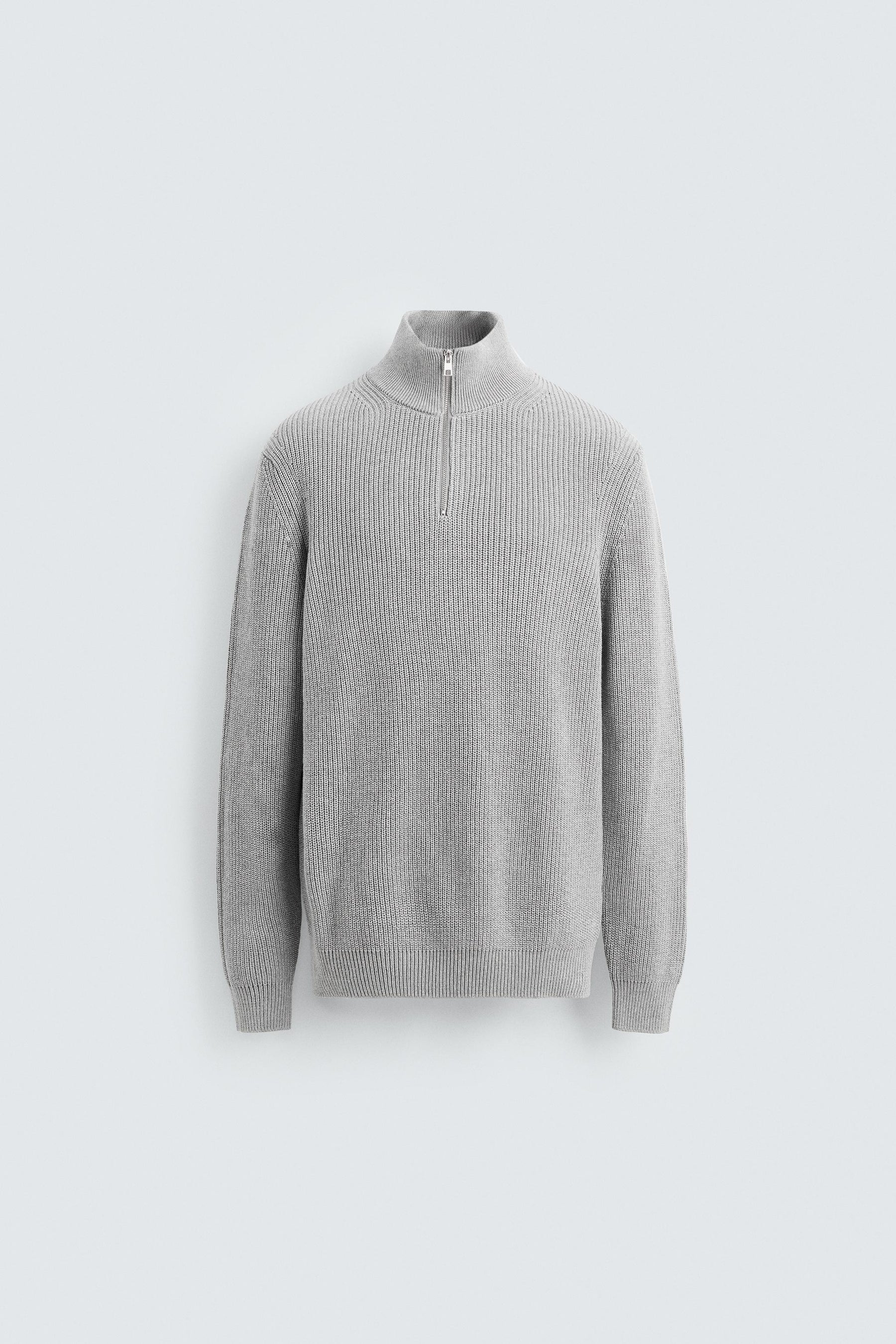 LINKSGESTRICKTER PULLOVER MIT REISSVERSCHLUSS